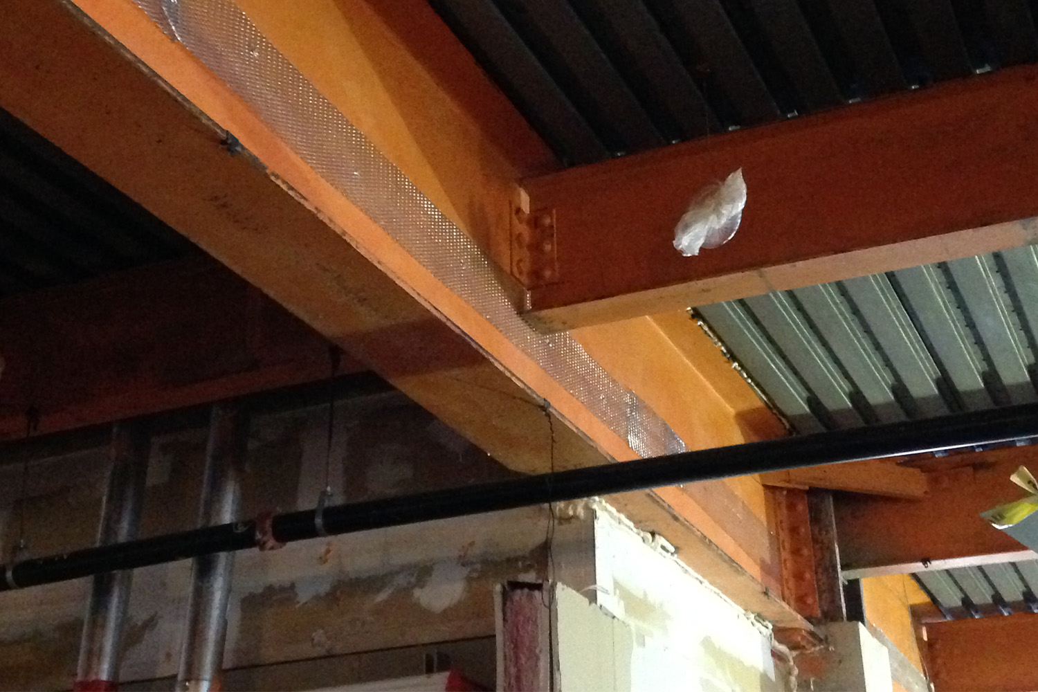 Zoomed in image of ductwork on ceiling at the Rodino building's 14th floor