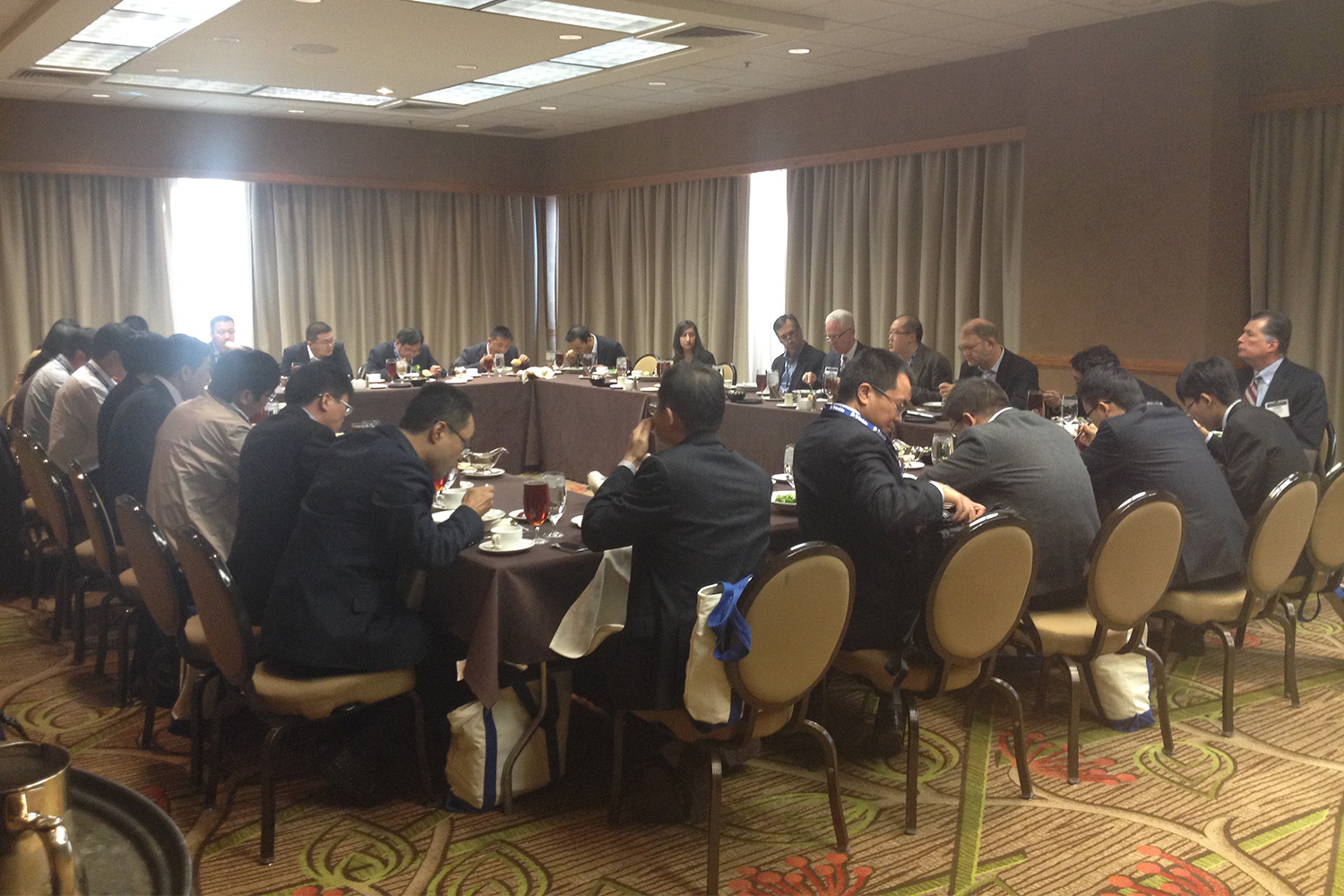 John Tocci and Laura Handler with Chinese delegation enjoying meal at the BIMForum in Denver