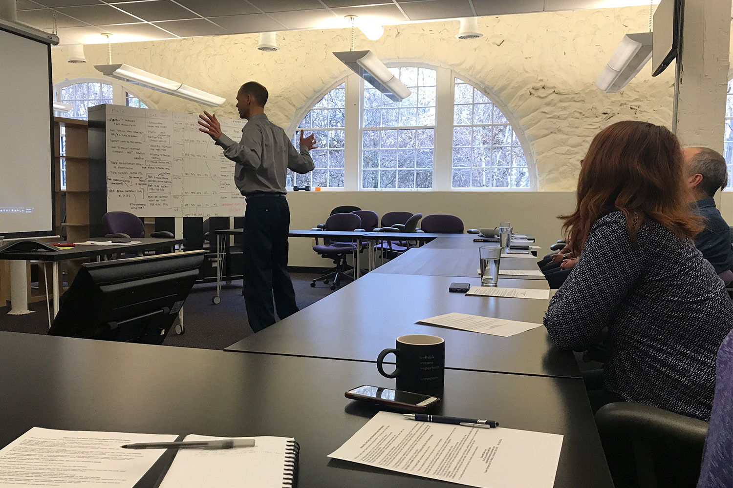 Dr. Scott Fuller speaks to Tocci staff about how to prevent neck and back pain caused by inactivity from sitting at desk stations