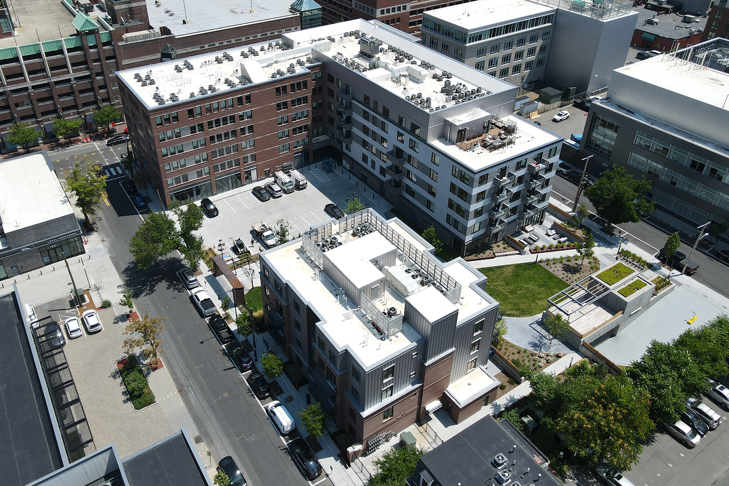 Aerial view of Flats on First development in the summertime