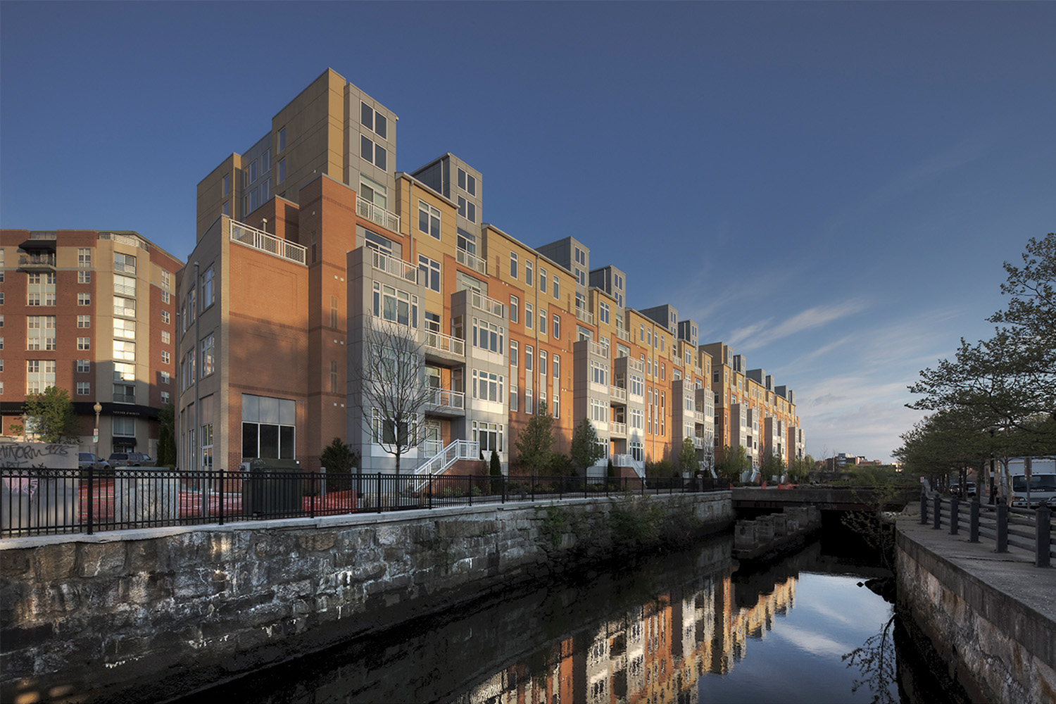 The Cove seen on the right of the river channel at dusk