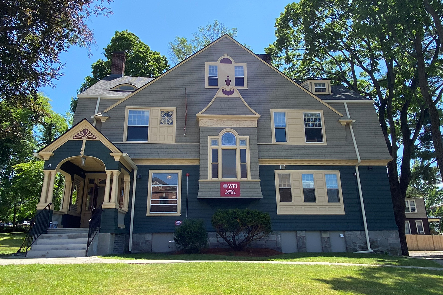 Victorian mansion with blue and cream paint renovated into student huousing