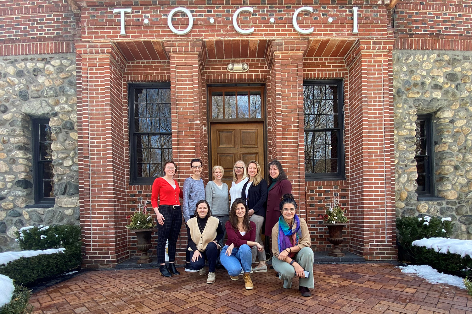 Group of women outside TOCCI office