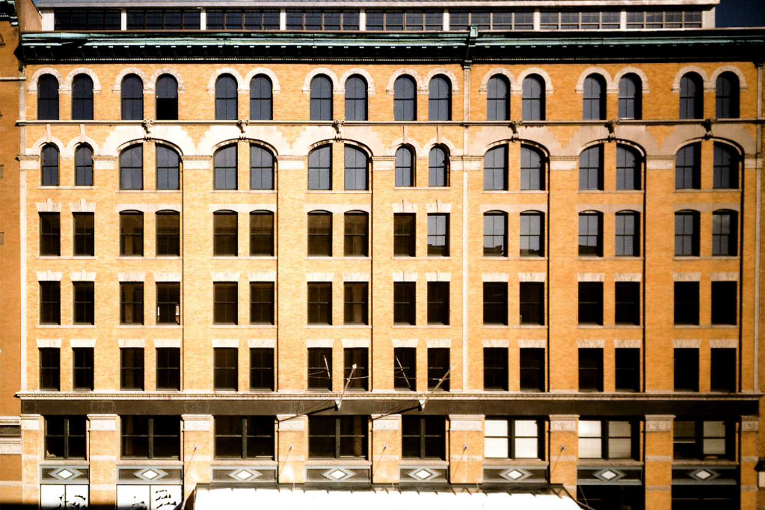 Zoomed-in front exterior, covered in sunlight