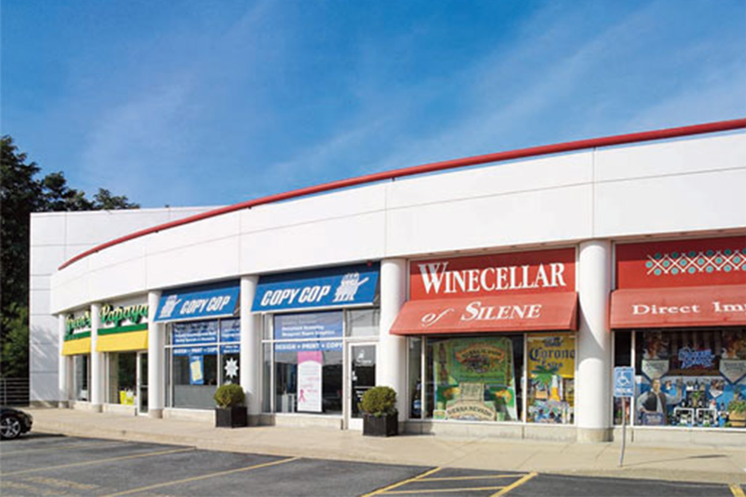 Storefronts for "Copy Cop", "Wine cellar", and "Papaya"