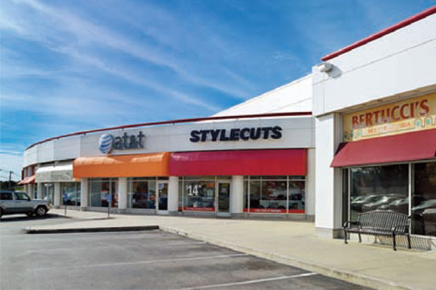 Storefronts for "AT&T", "Style cuts" and "Bertucci's"