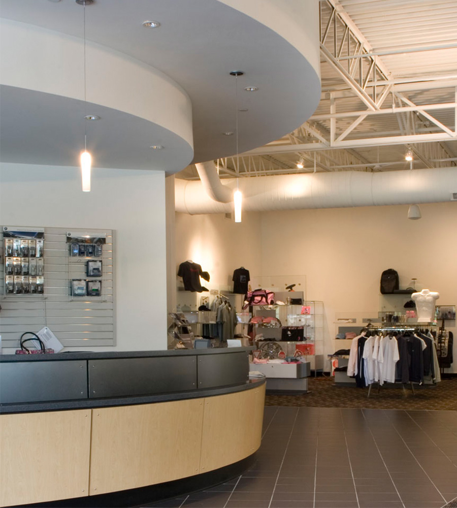 Circular reception desk next to lobby area 