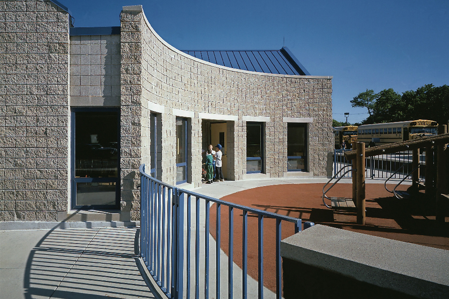 Building entrance next to kids playground 