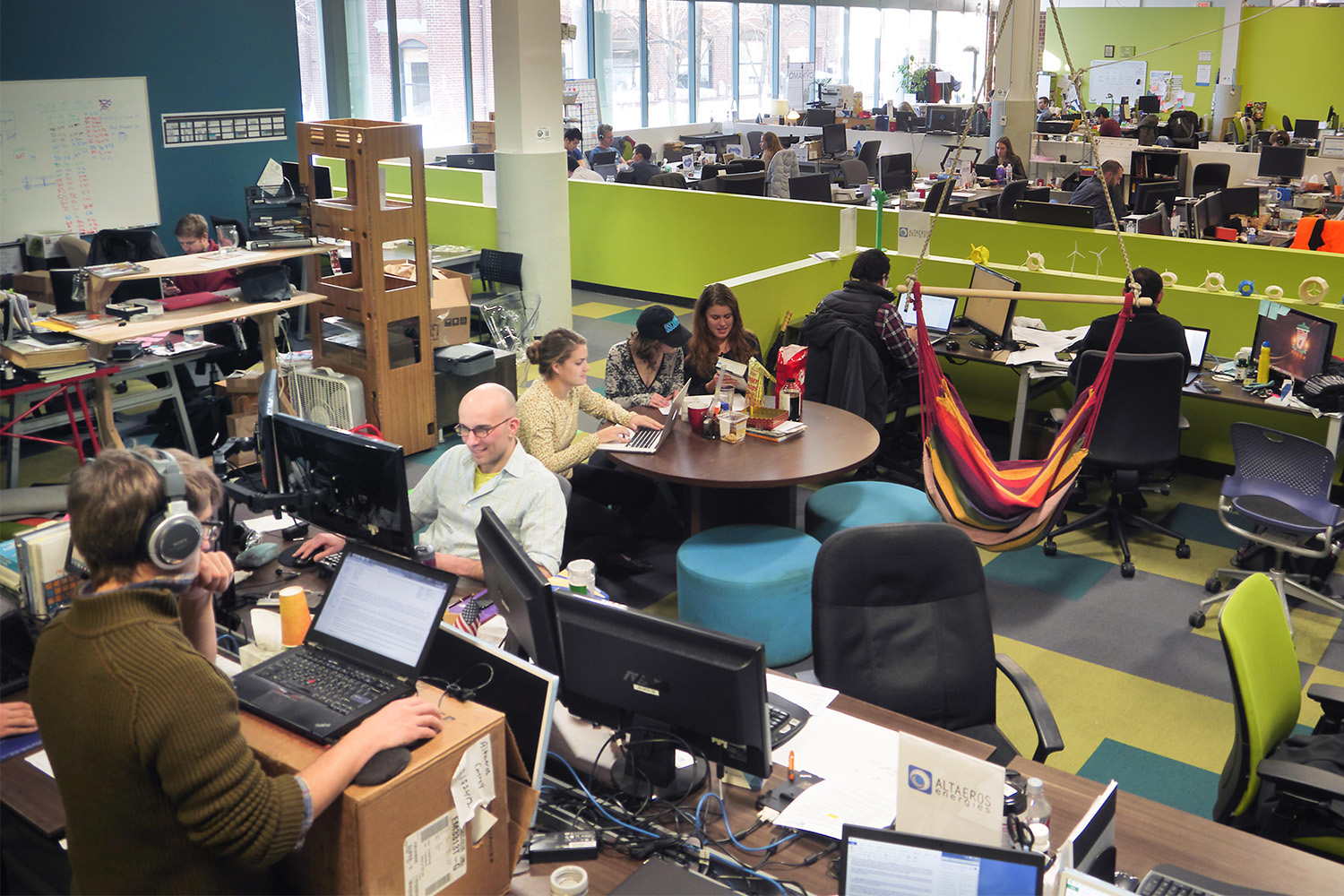 People working in bustling office space