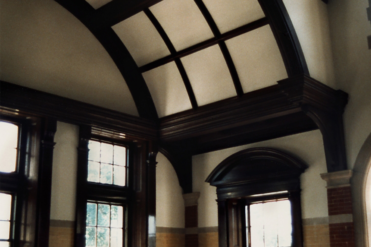 Tan ceiling with arched wooden beams in Searles Building