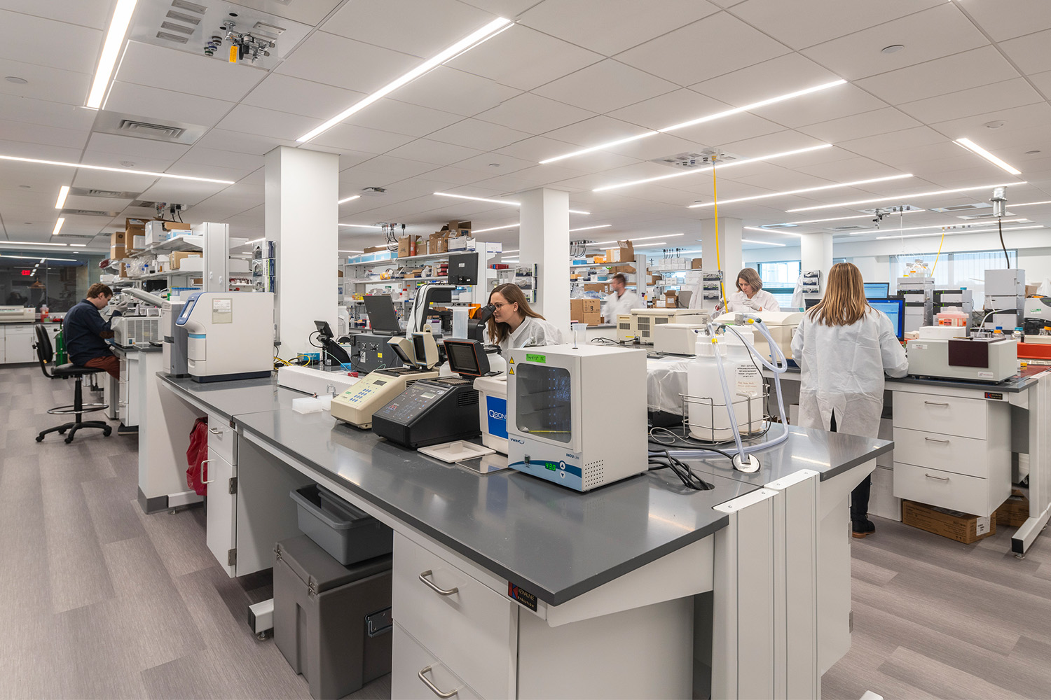 Angled view of Torque Therapeutics lab, with scientific tools and machinery 