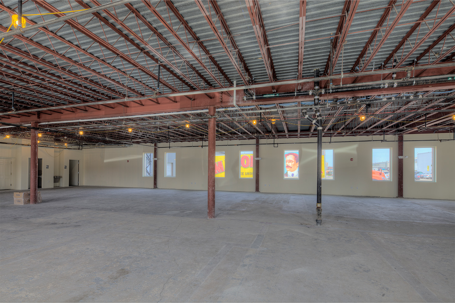 Interior of garage, with exposed metal beams 