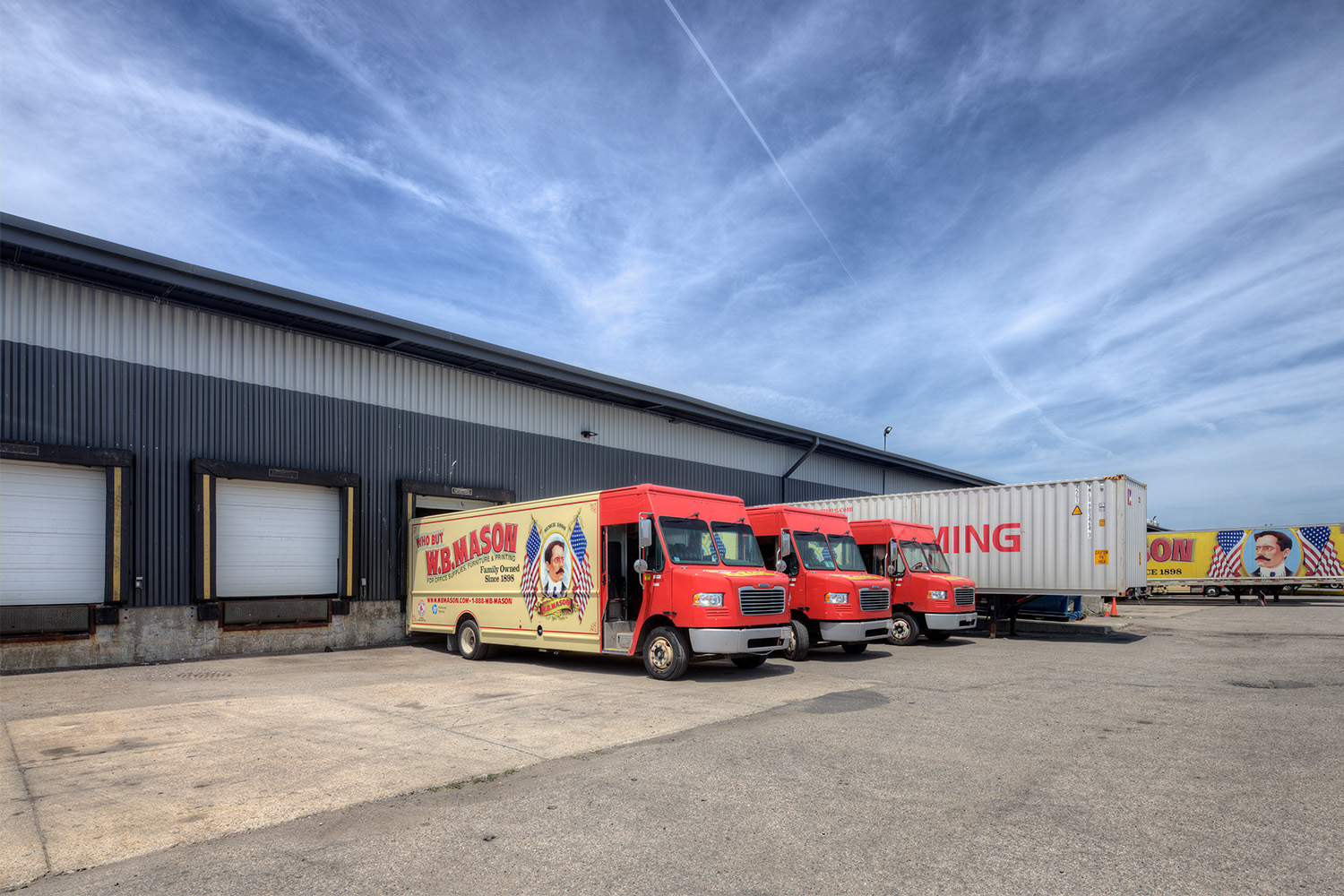 Truck loading dock attached to building exterior