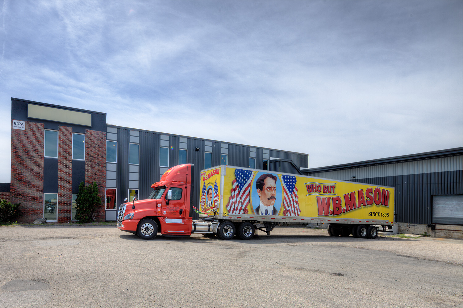 W.B. Mason truck parked outside of building 