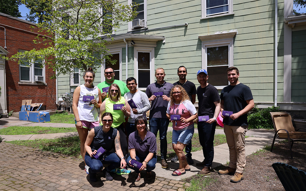 Tocci volunteers taking group photo at Project Hope in Roxbury 