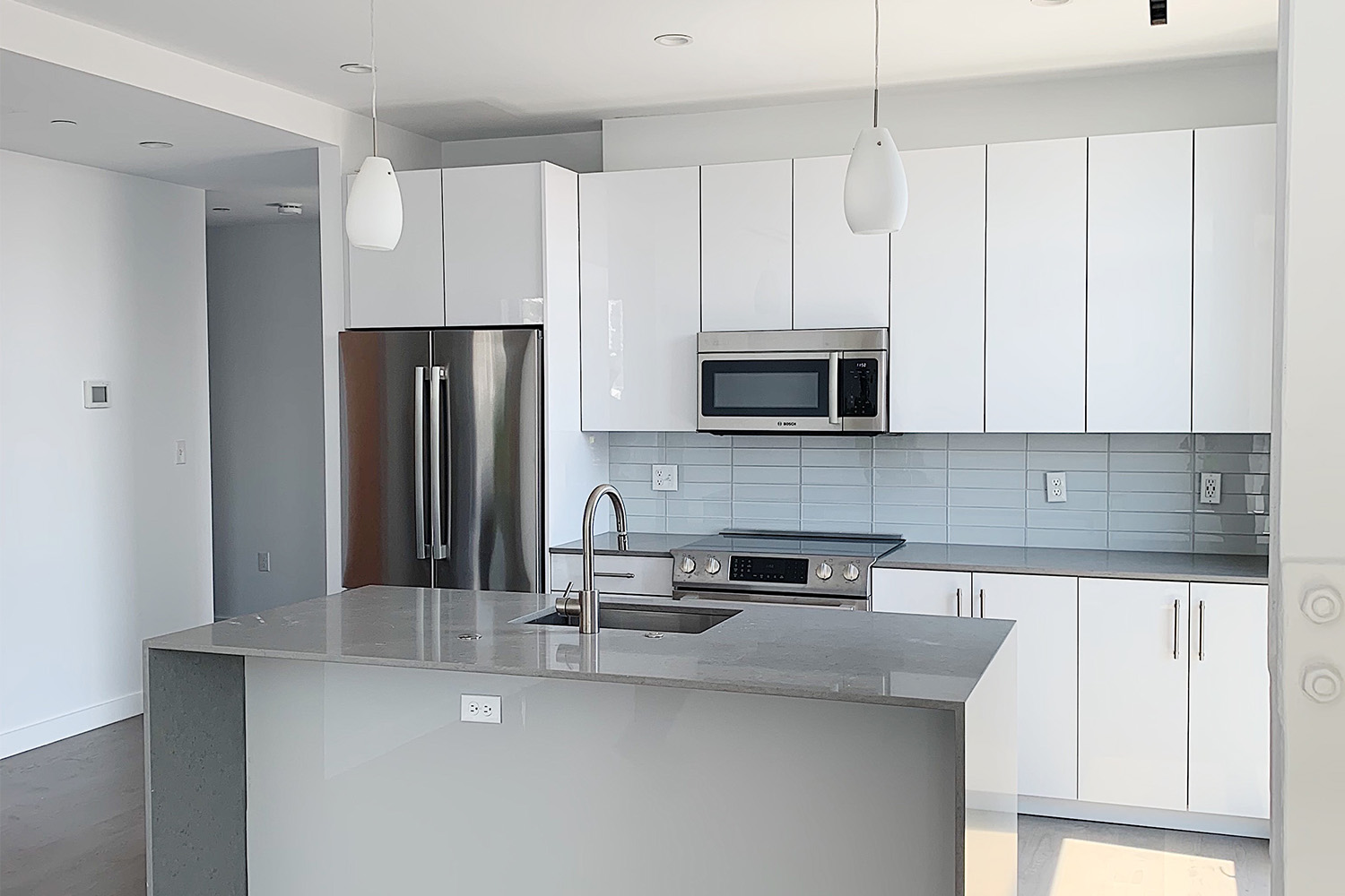 White kitchen with island