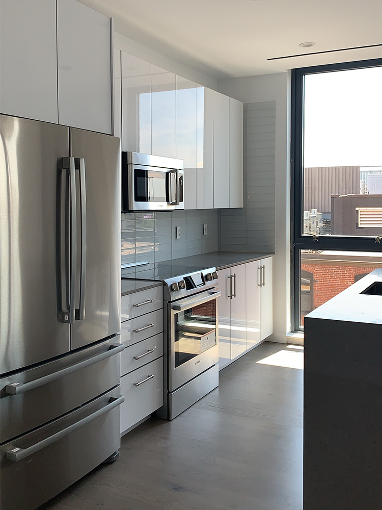 Kitchen with oven and fridge