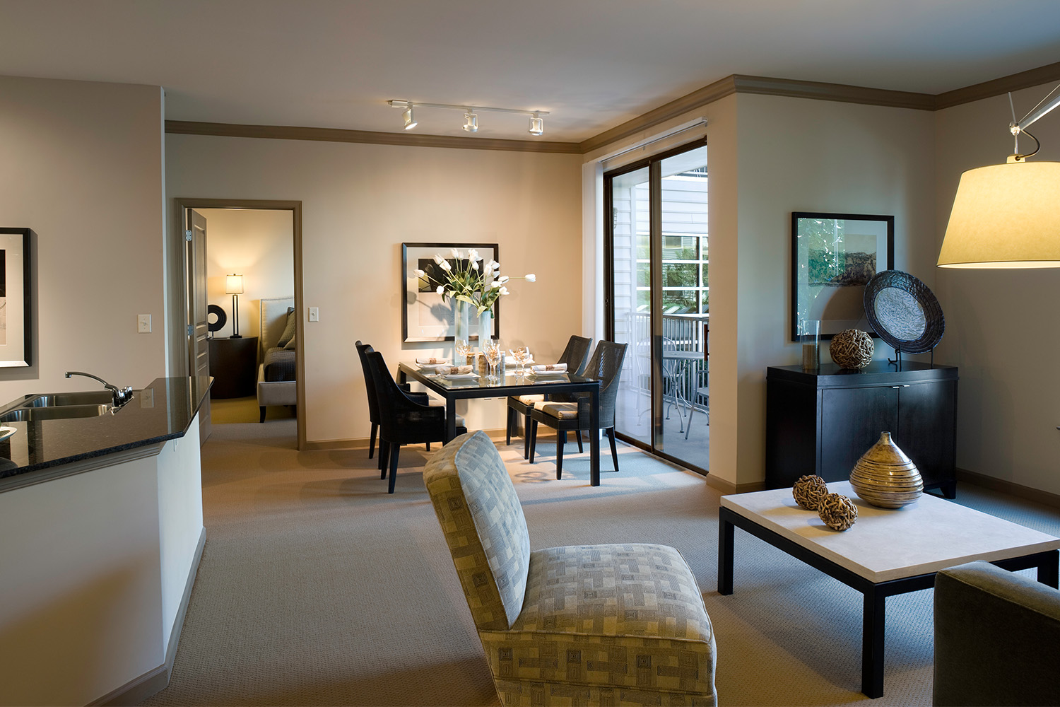 Tan living room with French doors 