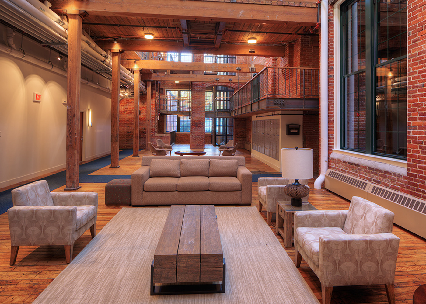 Lobby area with wooden beams overhead 