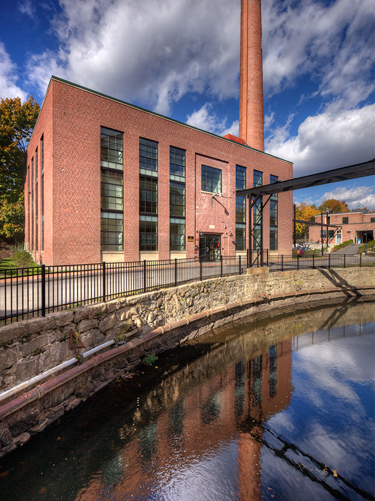 View of the Abbot Mill stack next to the river 