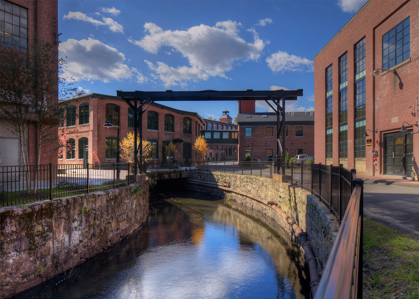 view of creek, between the apartment complex's 