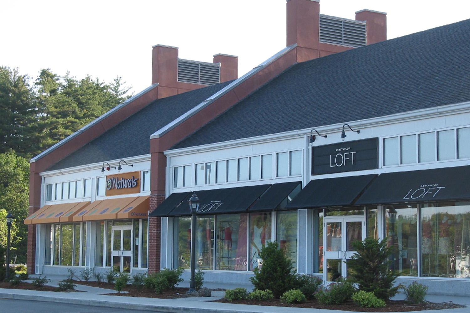 Exterior of the stores "Loft"  by Ann Taylor, and "O'Naturals" in the afternoon 