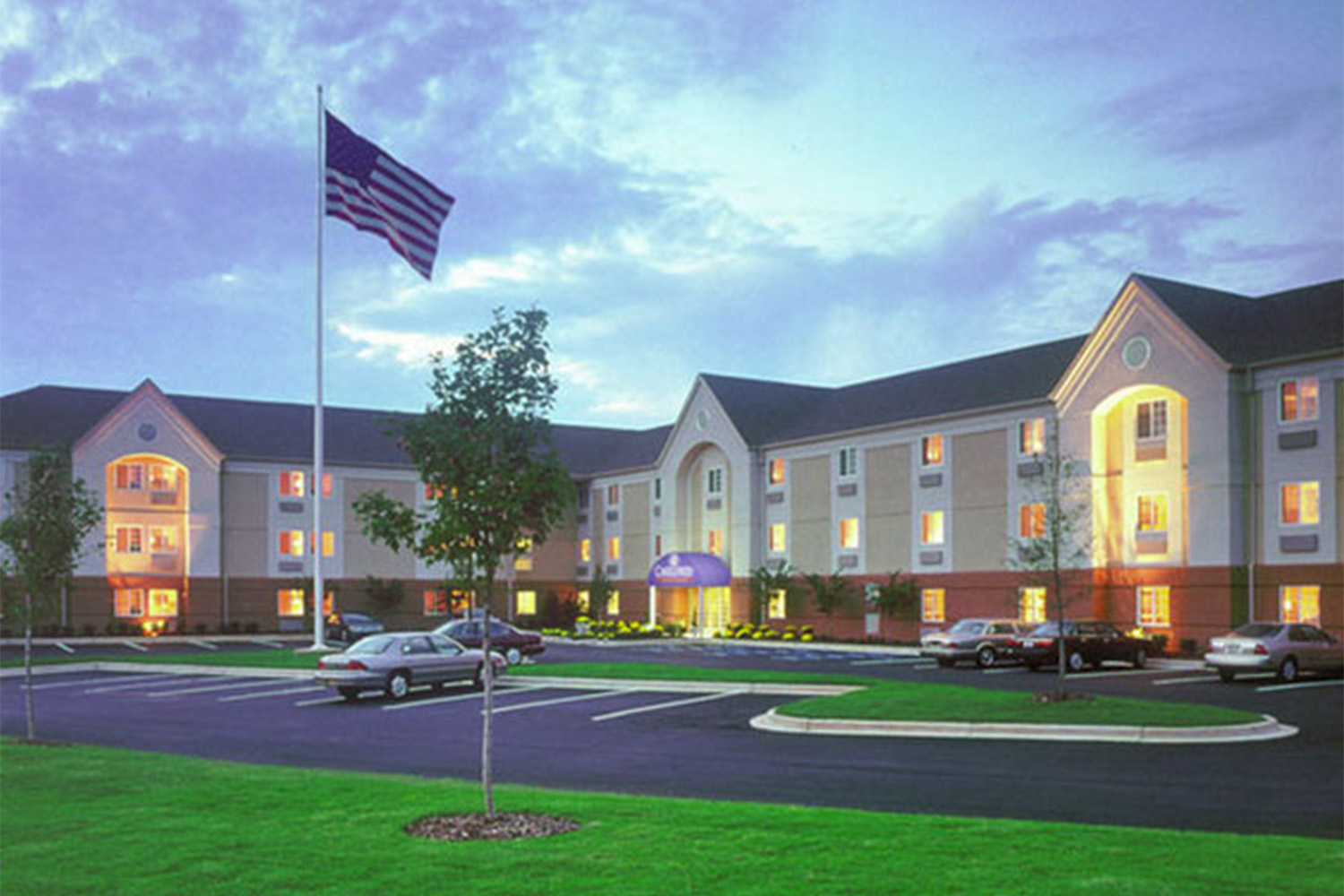 exterior of Candlewood Suites in Burlington, at nighttime