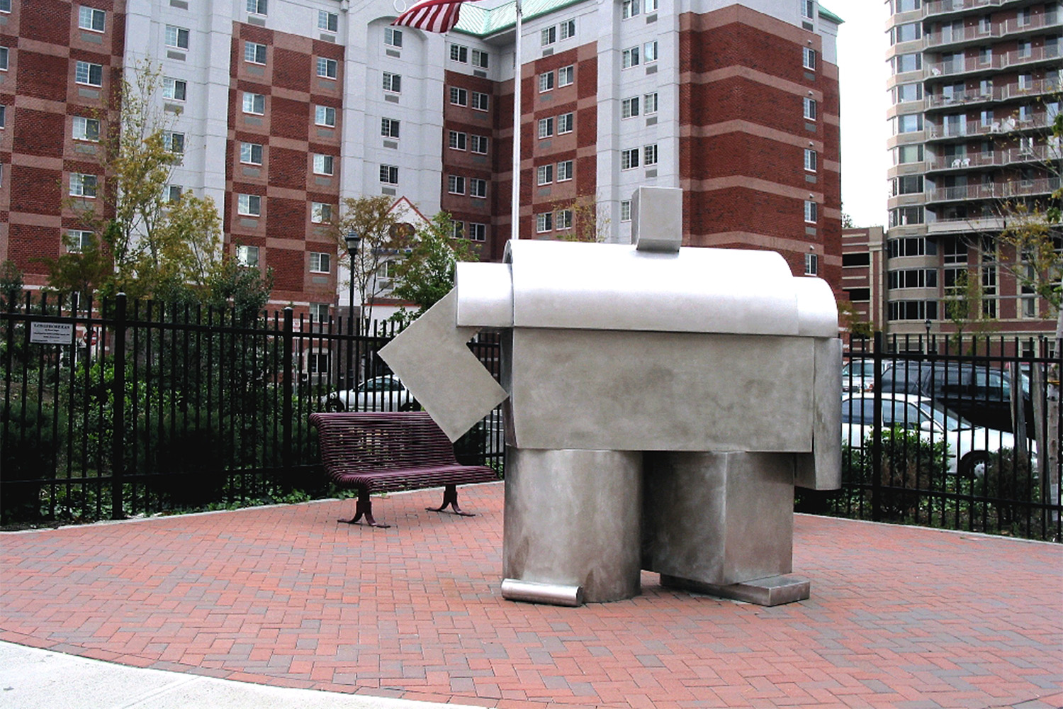 Modern-art sculpture made out of sheet metal, seen outside of hotel 