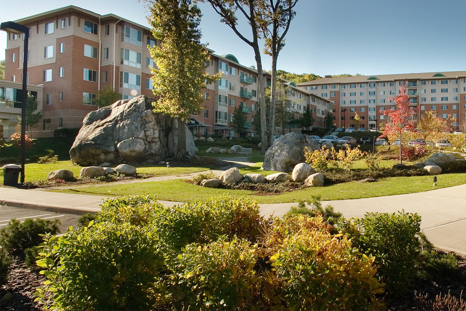 Exterior of Cedar Crest Village seen from across walkway 