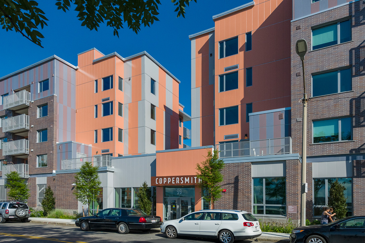 Building entrance, with street parking in the front