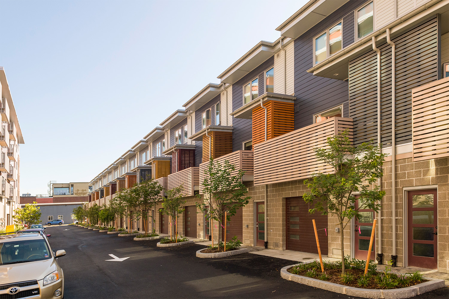 Rows of apartments in complex, near street parking
