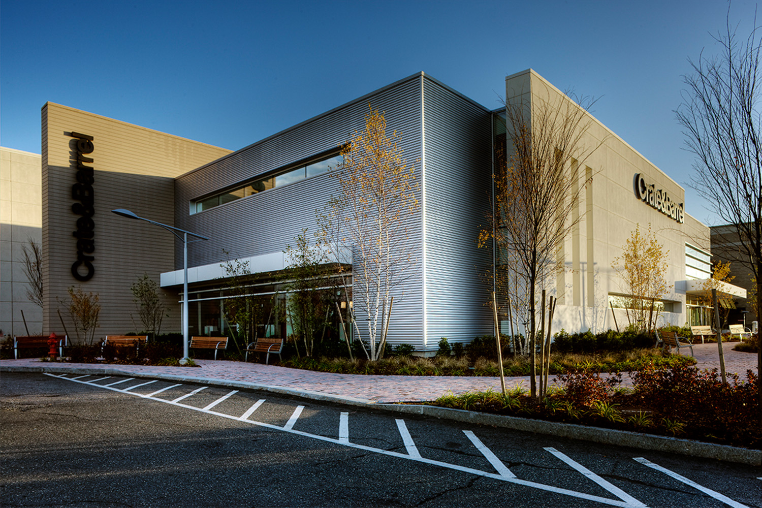 Exterior of Crate & Barrel, seen next to parking area