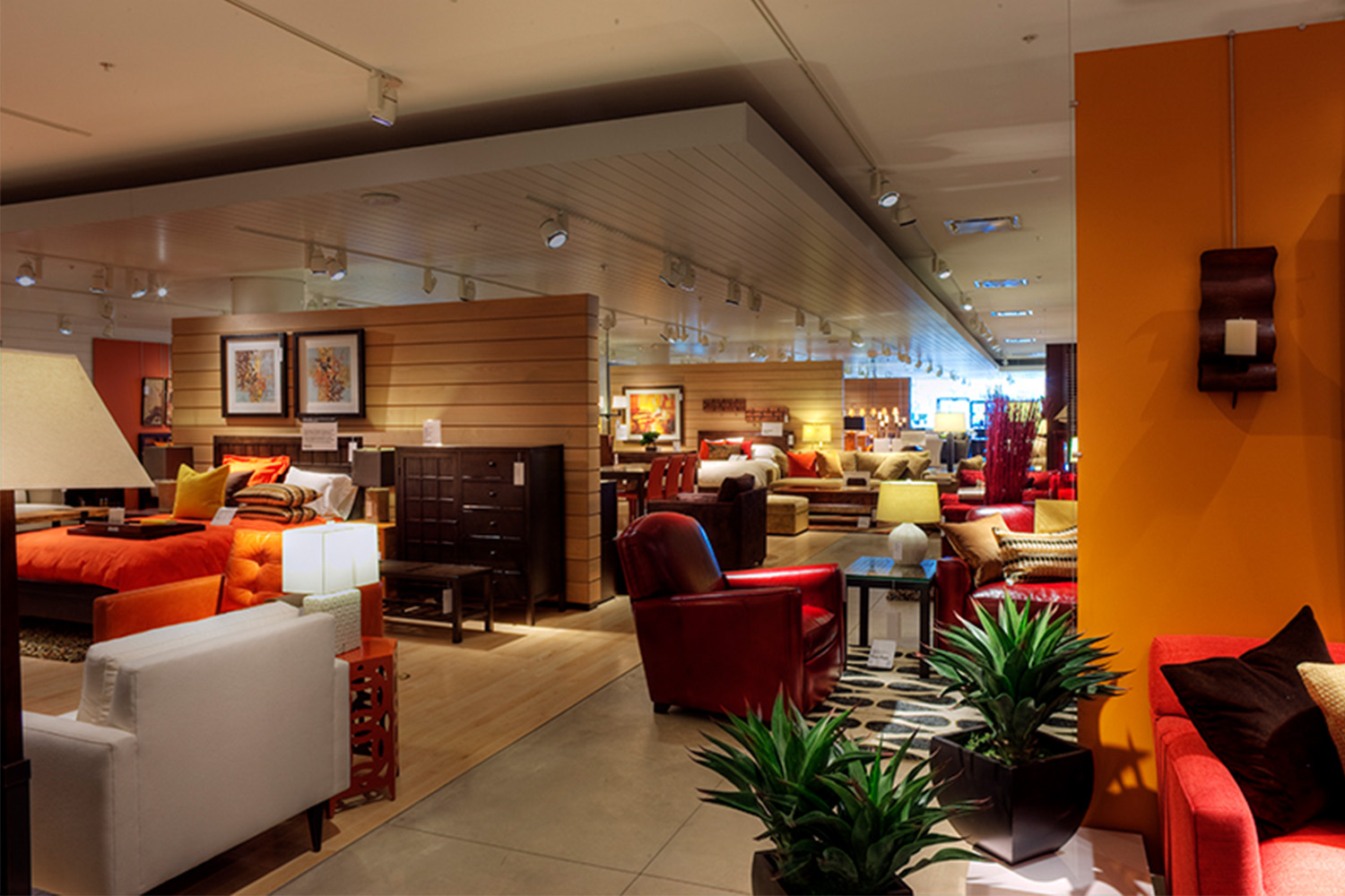 Living room/lounge area merchandise, such as plush couches and cozy chairs