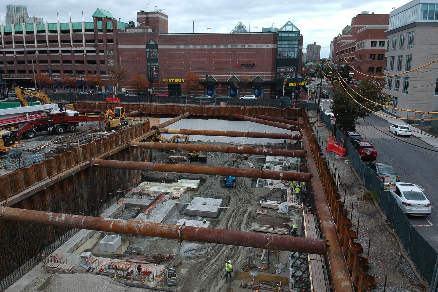 Drone view of the initial stages of roofing structure being built 