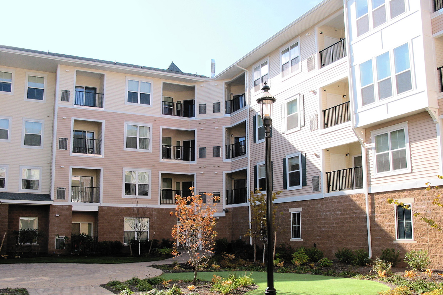 Courtyard with walkways and classic black streetlamps