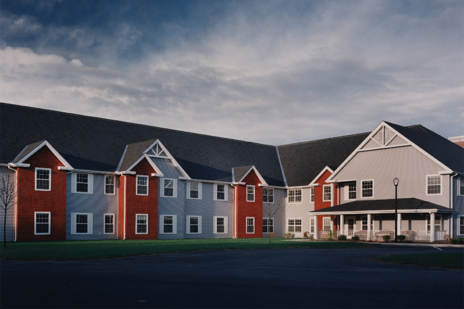 Façade of blue and read townhouse exteriors 