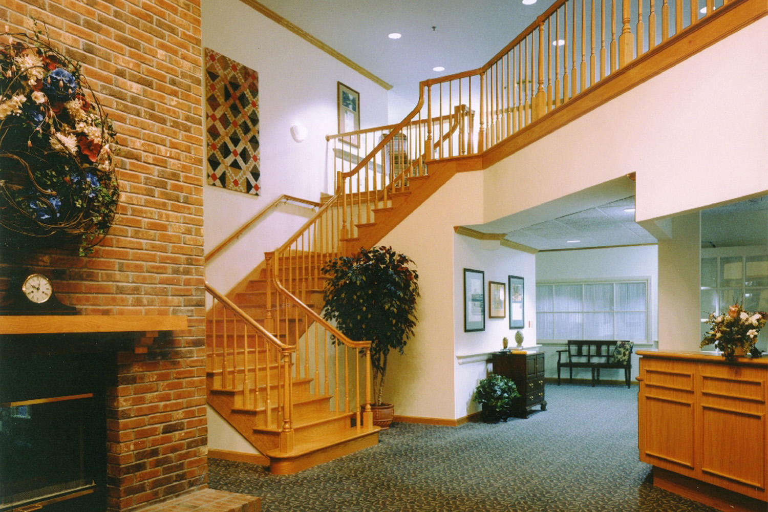 Wooden staircase from lobby to 2nd floor 