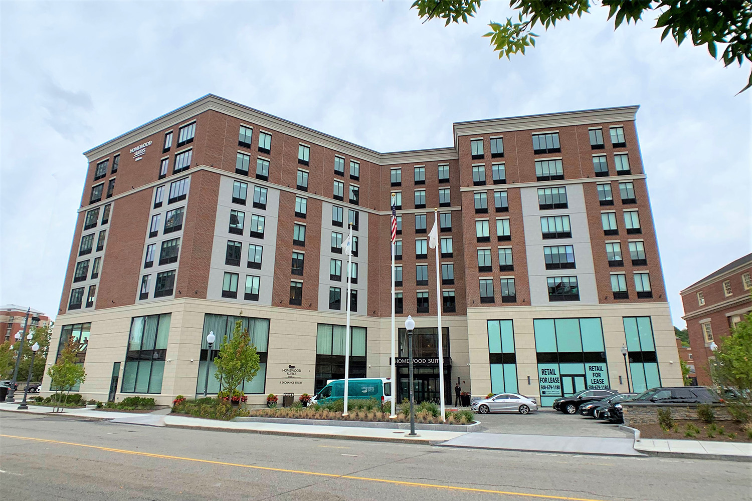Front exterior of Homewood Suites on a cloudy day