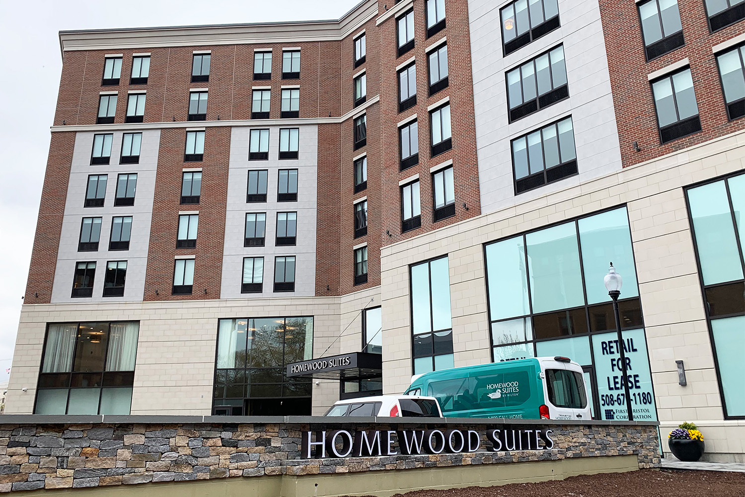 Homewood Suites sign outside of building 