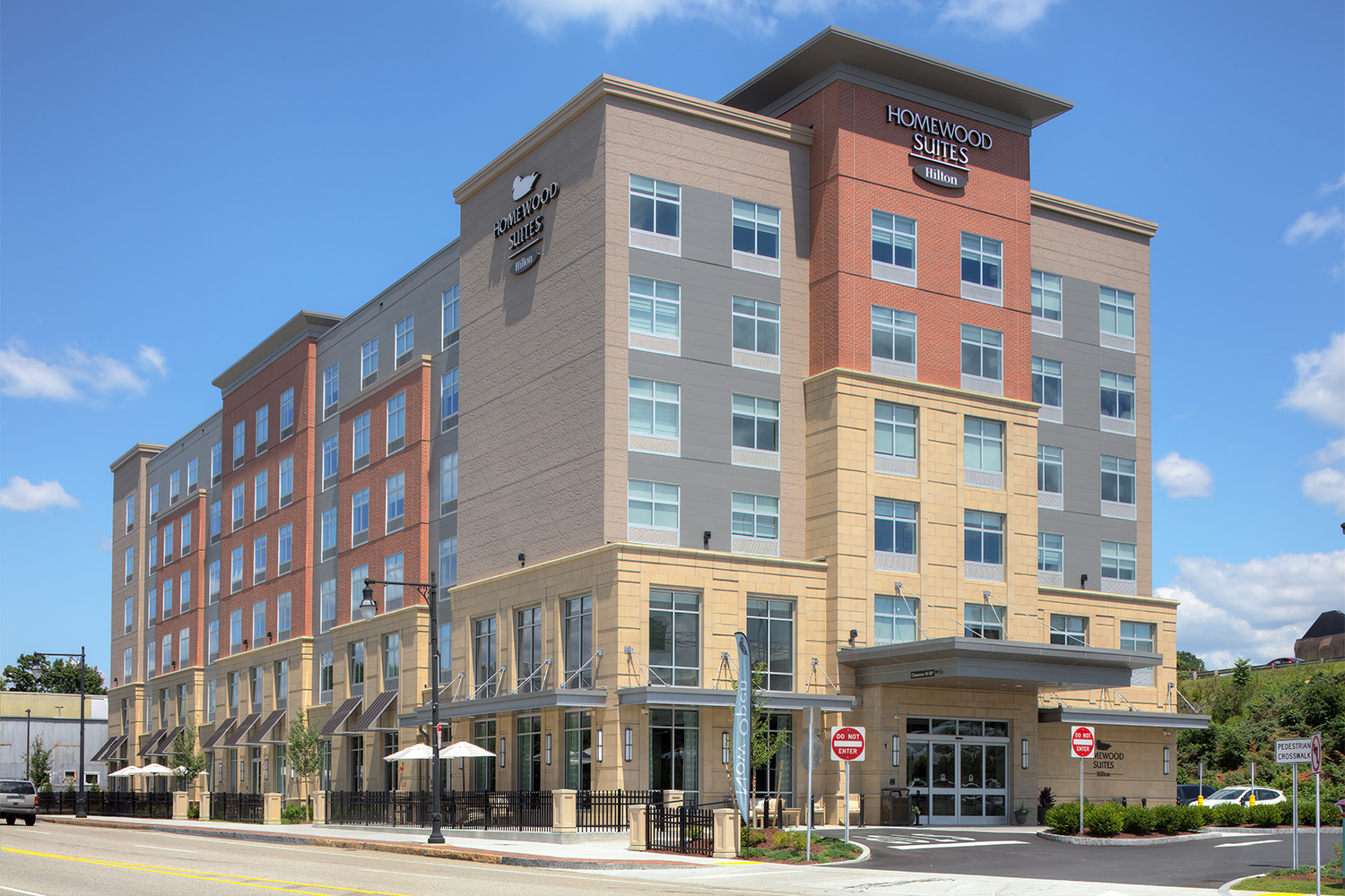 Angled side profile of Hollywood Suites exterior