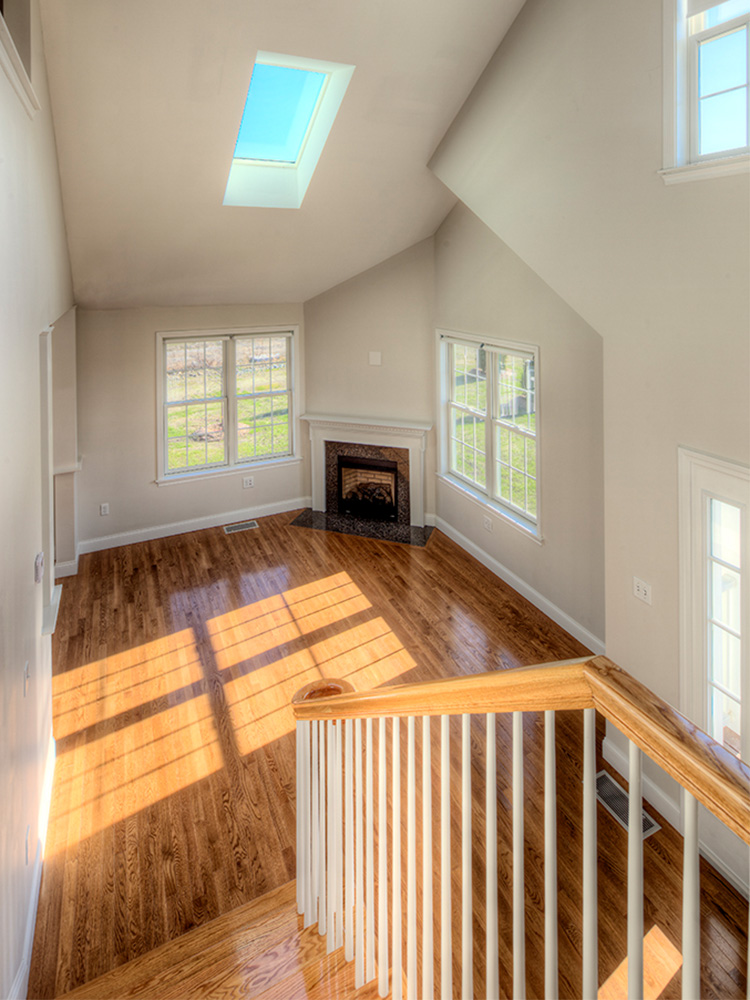 Foyer as seen from the top of the wooden staircase