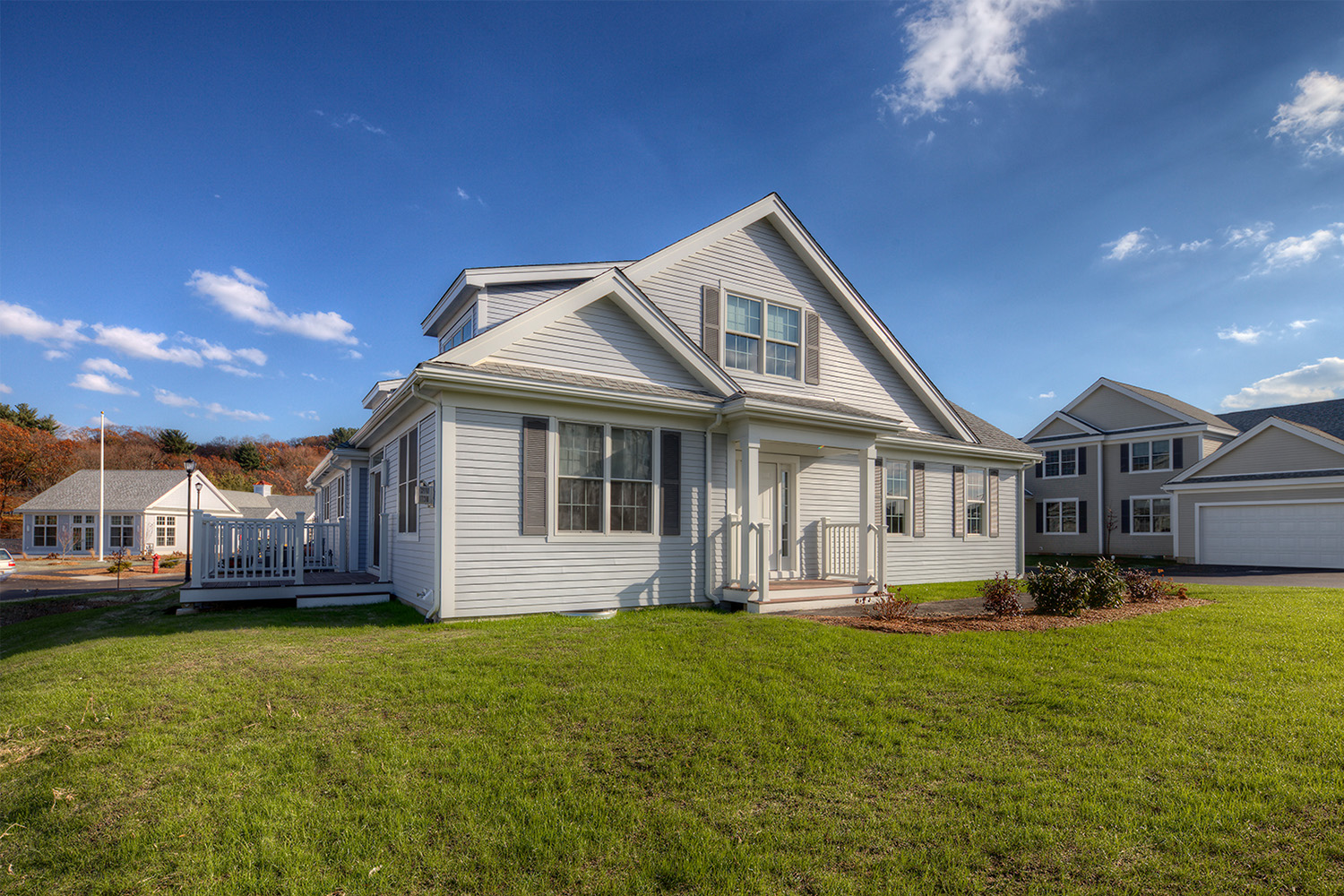 Sun shining on sideview of townhouse exterior 