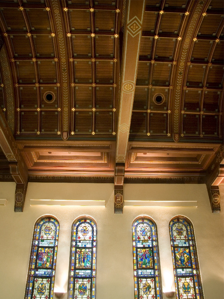 Zoomed-in view of woodwork detailing in chapel ceiling