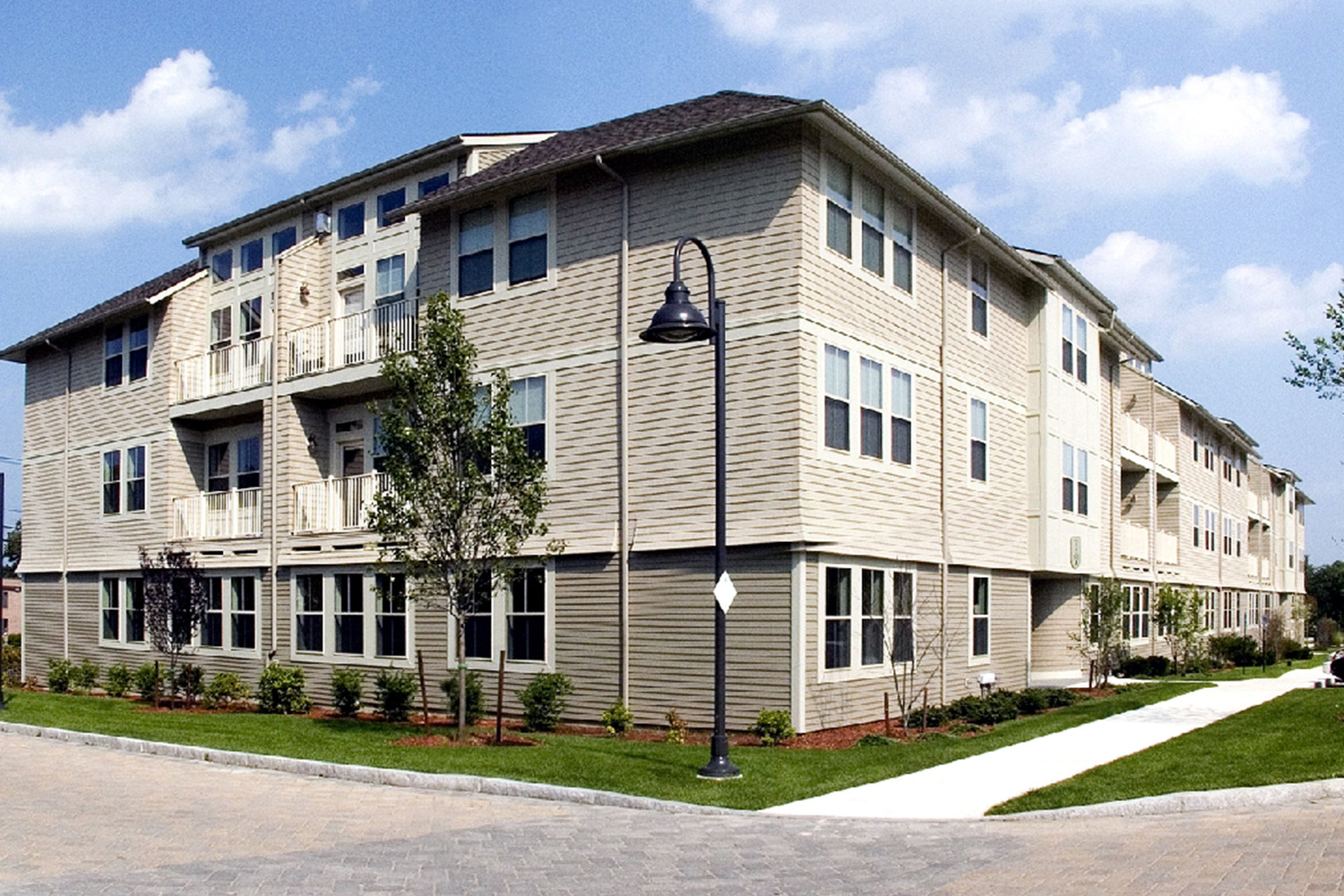 Exterior of Oakridge Village complex seen from an angled distance 