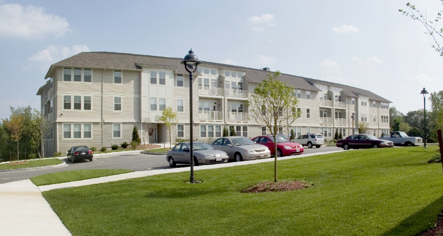 Longview of exterior, with parking lot in the front