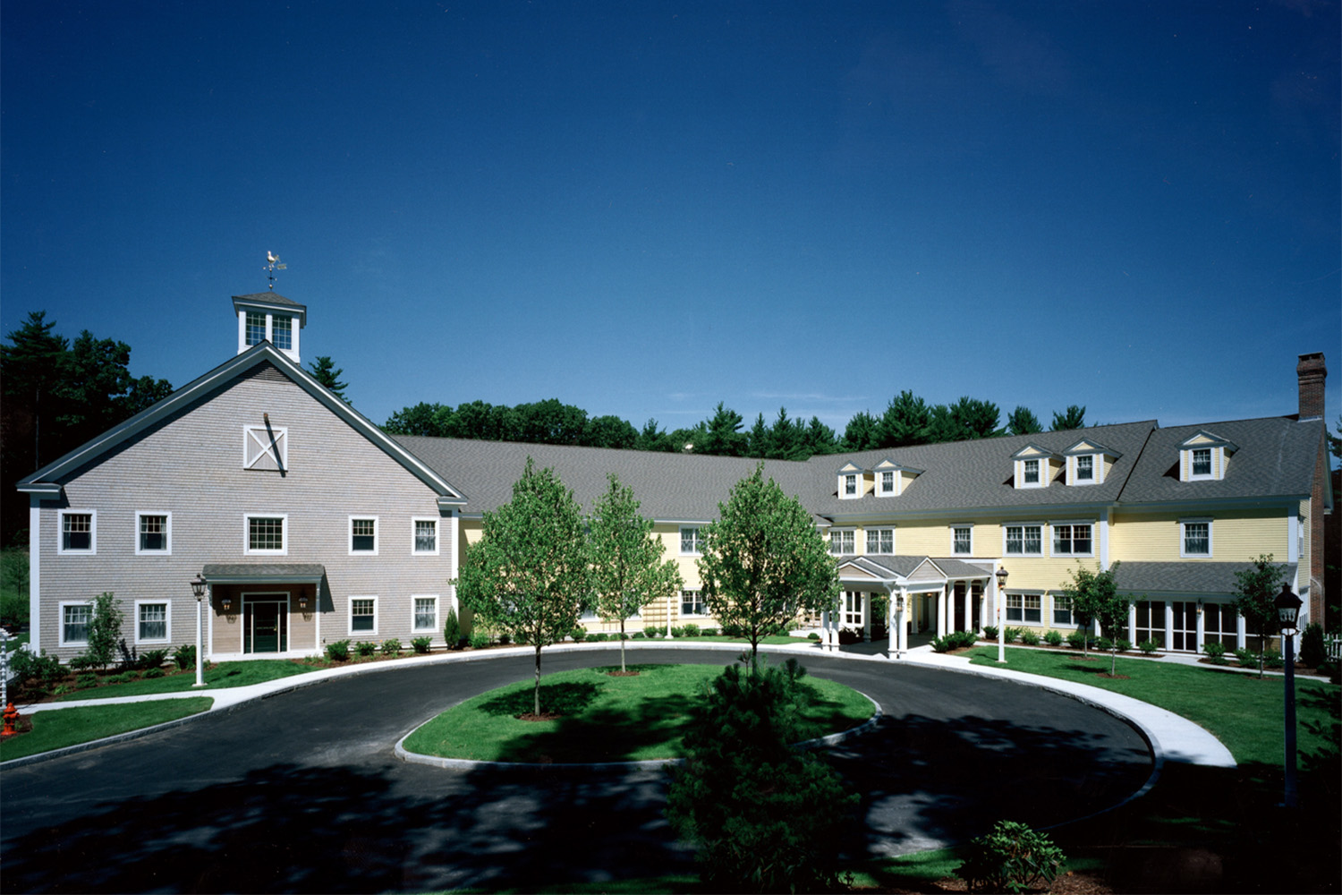 Full view of front exterior, with roundabout in front