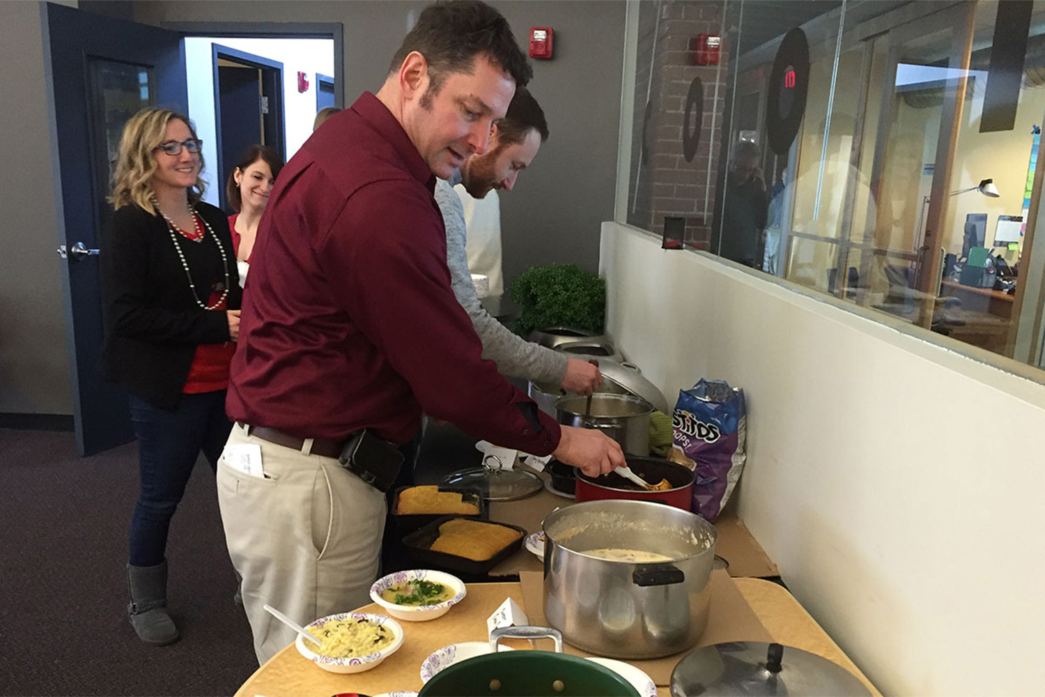 Tocci employees serving themselves soup