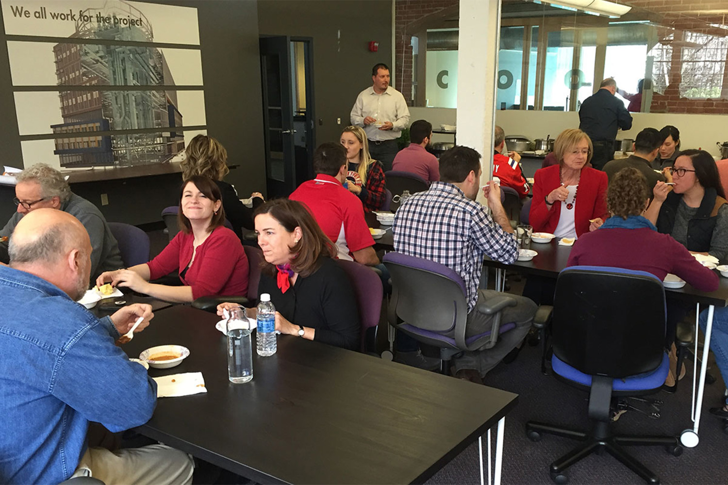 Employees eating soup