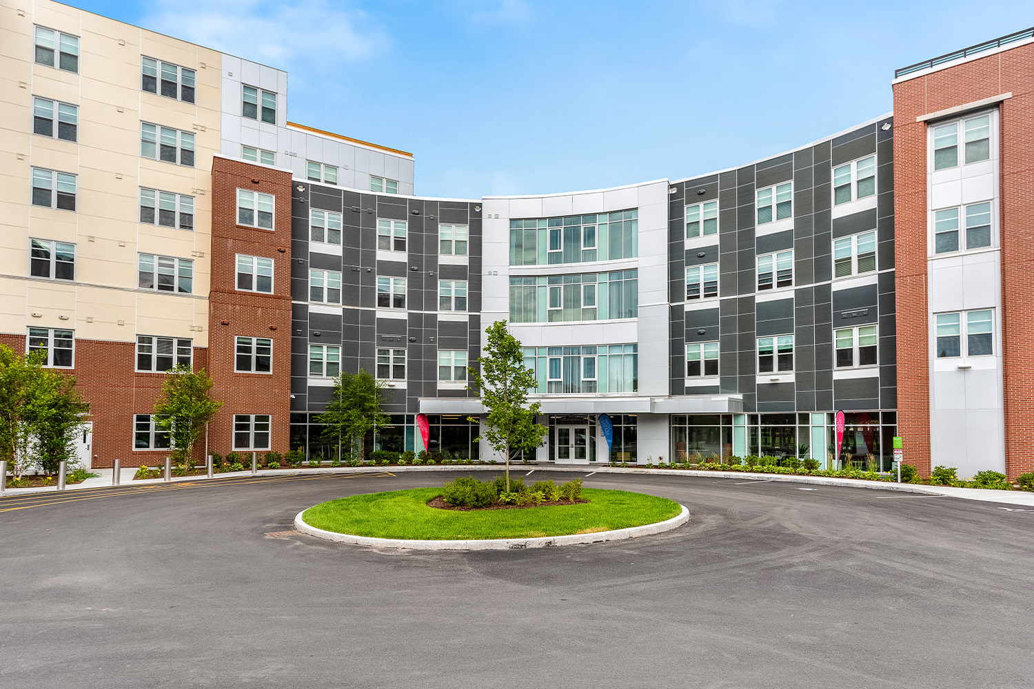 View of front exterior, with roundabout in front of building 