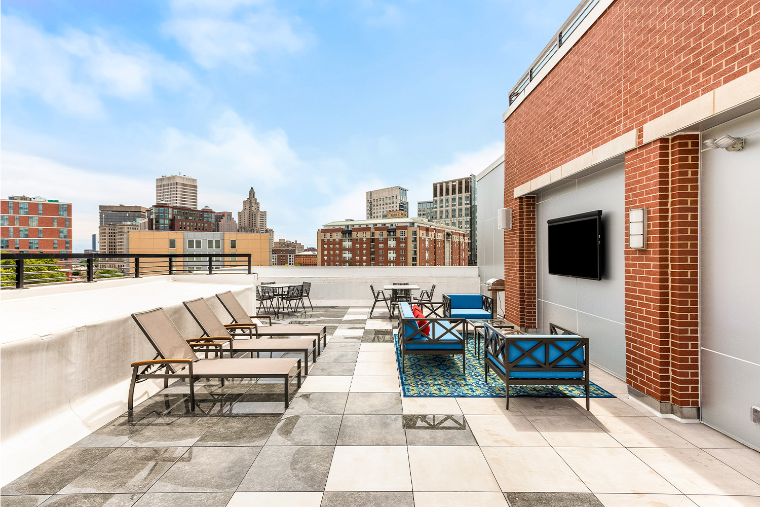 Rooftop patio with view of the cityscape 
